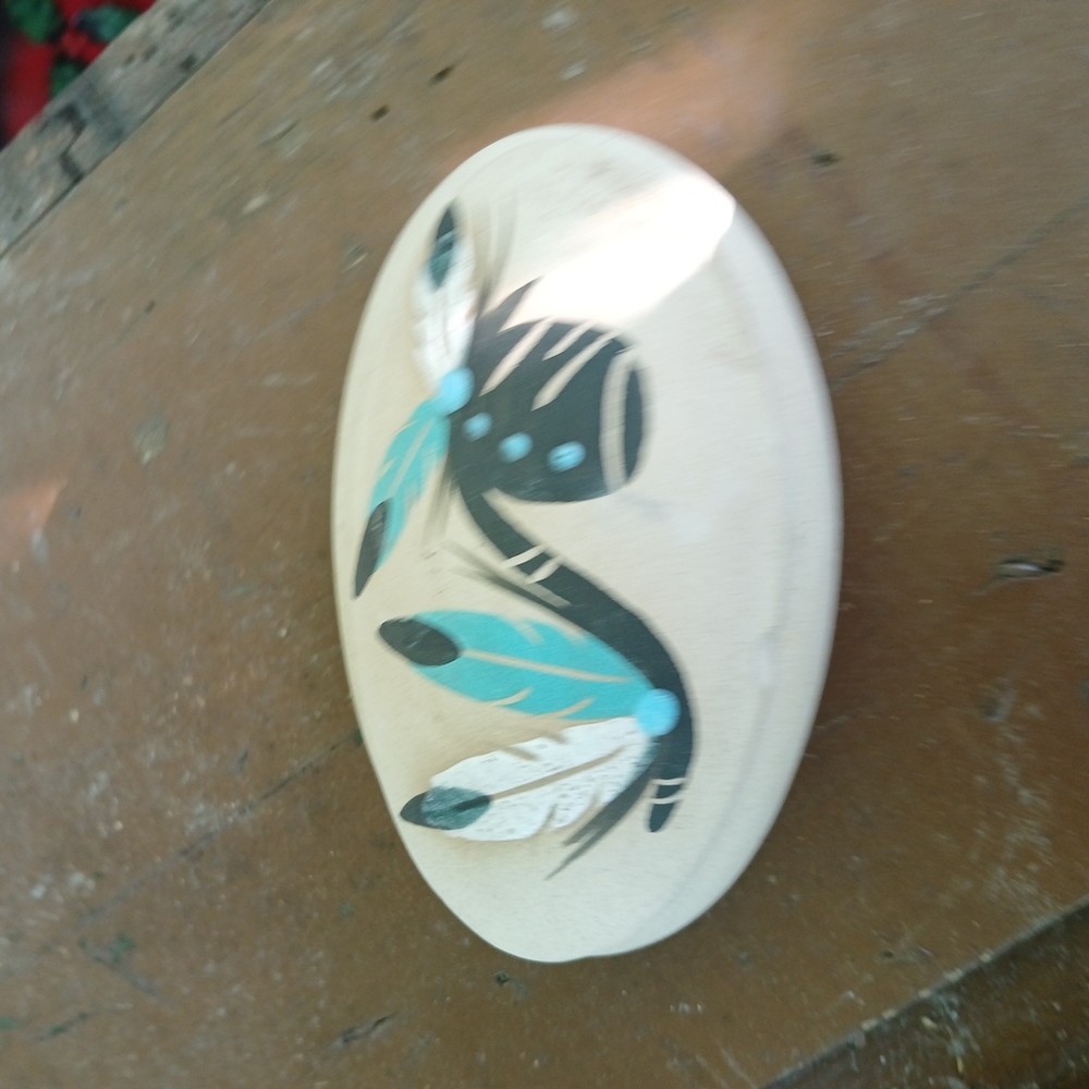 Handcrafted Oval Stone with Feather Design